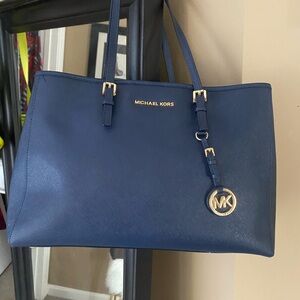 Michael Kors Blue Tote Bag with Gold Accents and Textured Finish